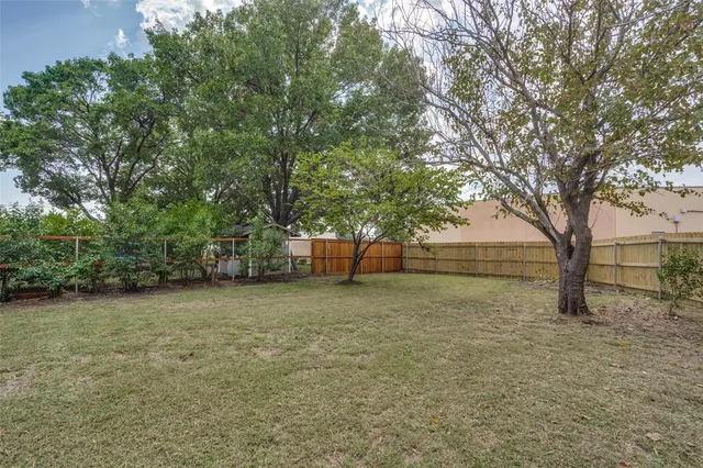 a house with trees in front of it
