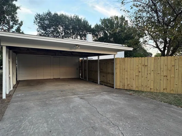 a view of backyard with green space