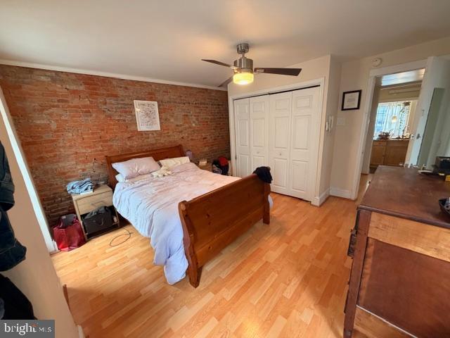 511 South 17th Street, Unit 1 Philadelphia, PA 19146 - Photo 7 of 15 a bed room with a bed window and a mirror