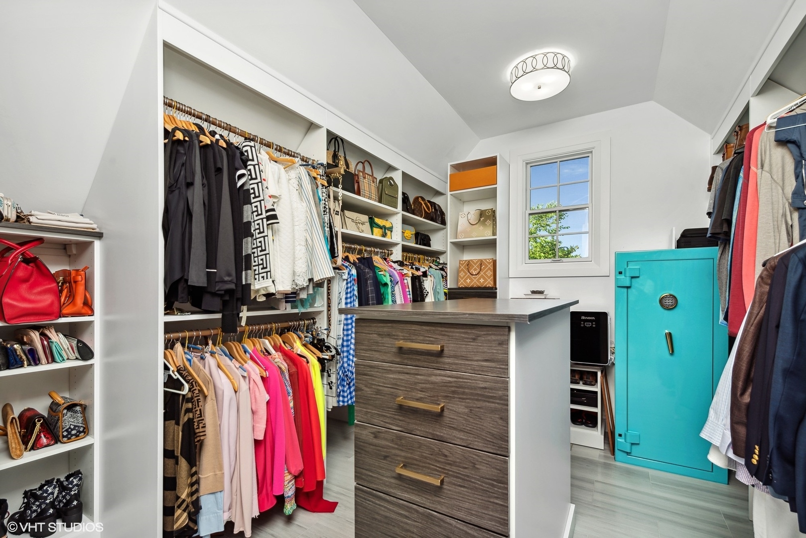 675 Old Barrington Road North Barrington, IL 60010 - Photo 31 of 73 a view of walk in closet with clothes and shoes