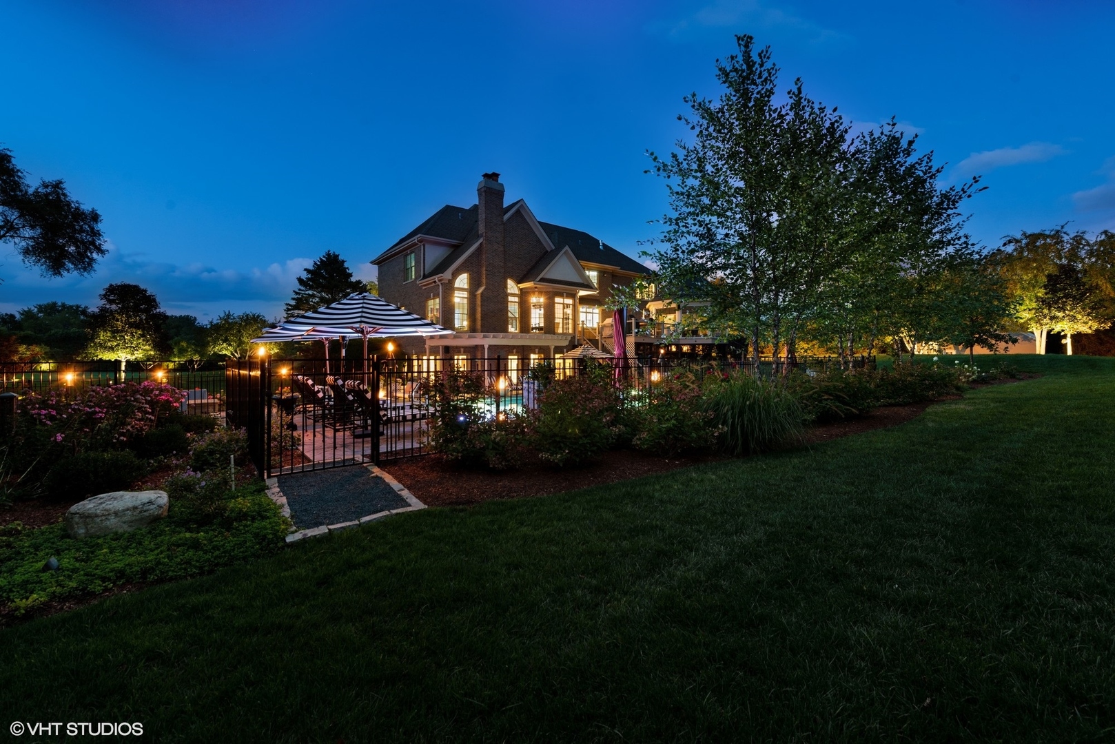 675 Old Barrington Road North Barrington, IL 60010 - Photo 65 of 73 a front view of a house with a garden