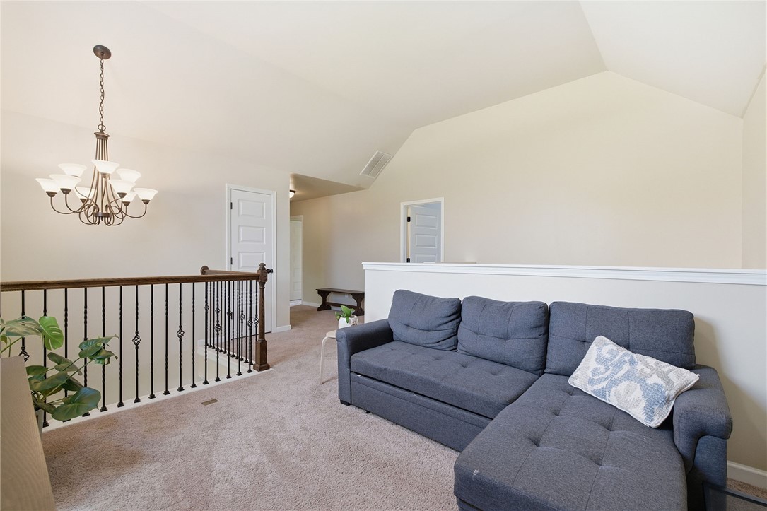 138 Buckland Drive Anderson, SC 29621 - Photo 29 of 49 This airy loft space boasts high ceilings and plush carpeting, ideal for a flexible living area.