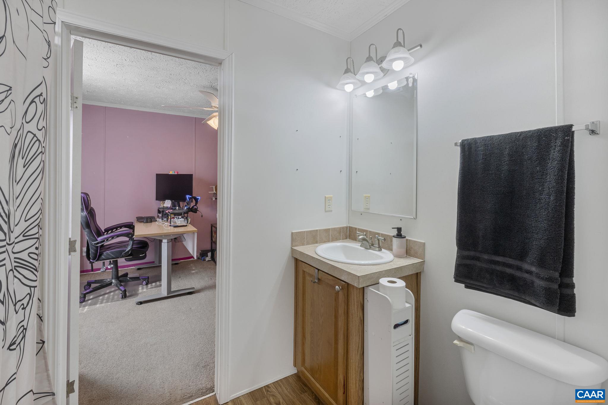 1173 Aylor Road Madison, VA 22727 - Photo 27 of 44 a bathroom with a sink toilet and shower