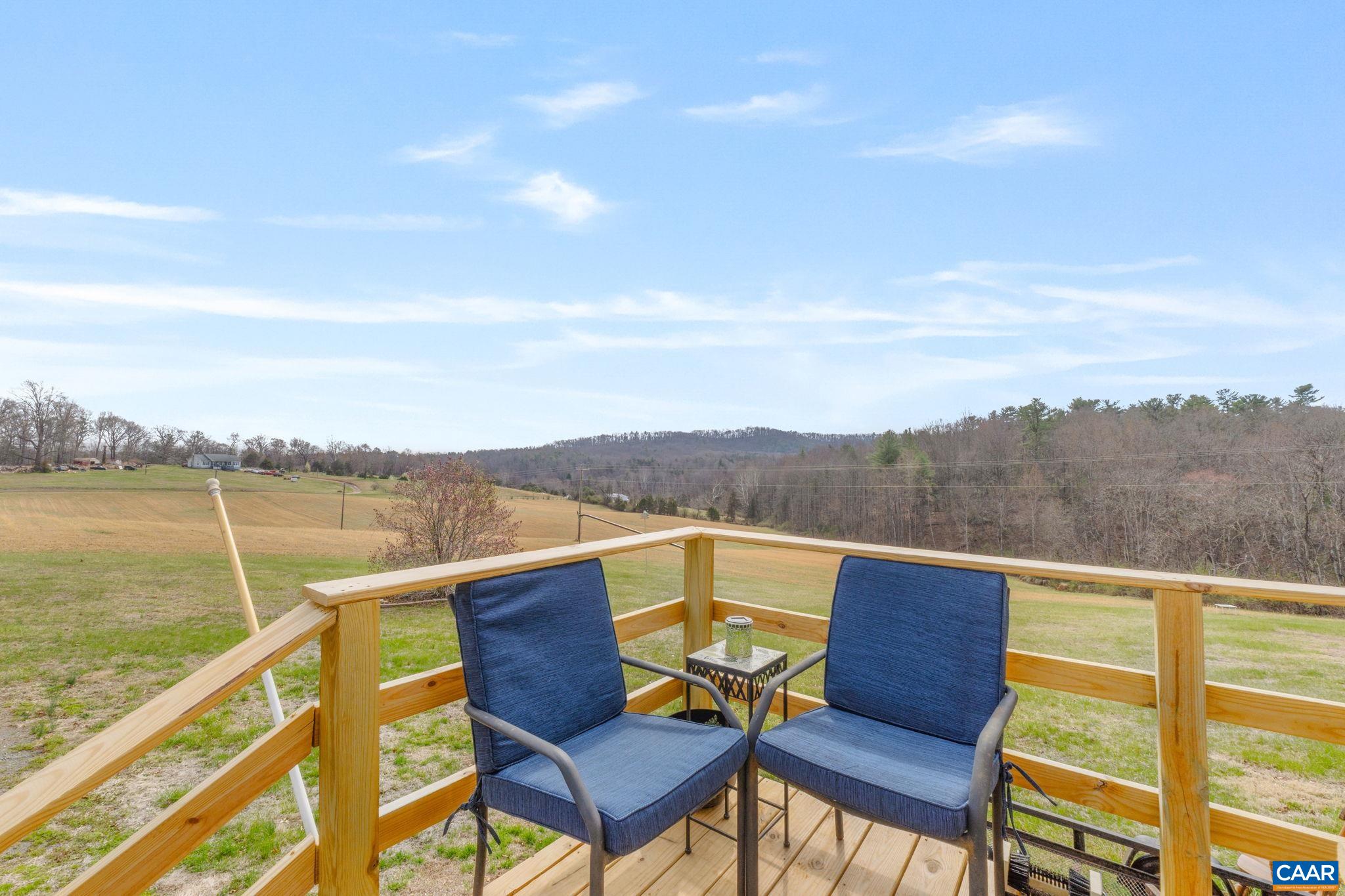 1173 Aylor Road Madison, VA 22727 - Photo 43 of 44 a view of a lake from a balcony with outdoor seating