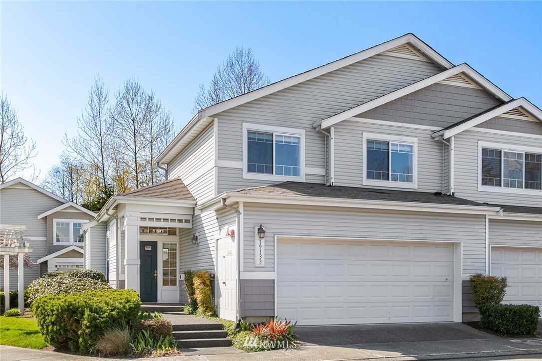 19133 110th Place Southeast Renton, WA 98055 - Photo 1 of 17 a front view of a house with garage