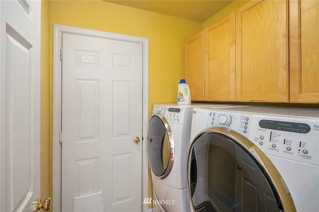 19133 110th Place Southeast Renton, WA 98055 - Photo 9 of 17 a utility room with dryer and washer