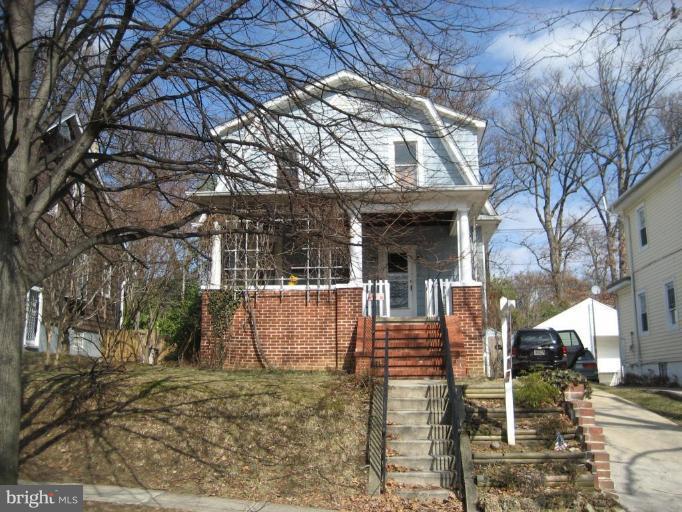 503 Westgate Road Baltimore, MD 21229 - Photo 17 of 24 a view of a house with a yard