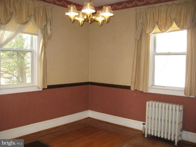 503 Westgate Road Baltimore, MD 21229 - Photo 8 of 24 a view of an empty room with a window