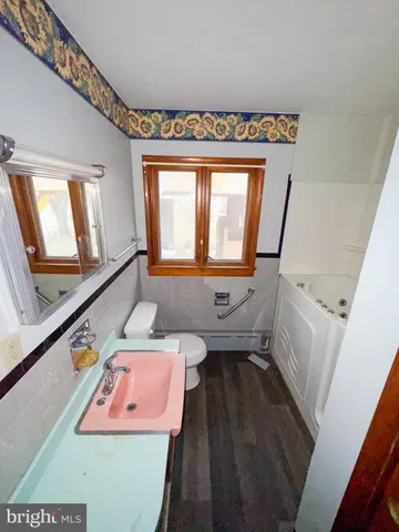 a bathroom with a sink and a bathtub