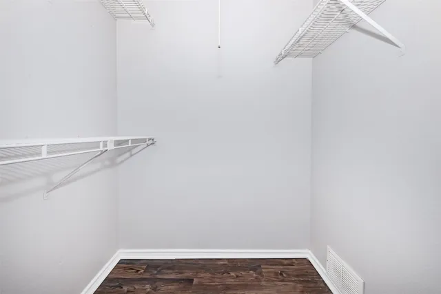 a view of a room with racks on the wall