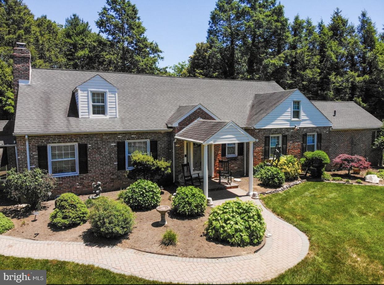 1409 Hampton Road Rydal, PA 19046 - Photo 1 of 50 a front view of a house with a yard