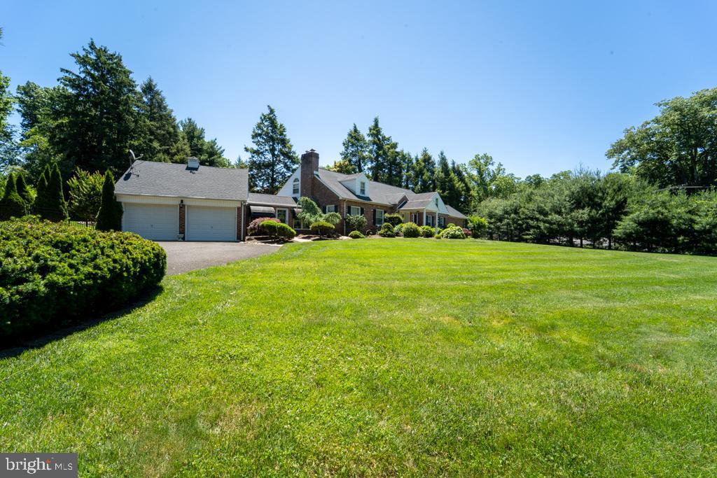 1409 Hampton Road Rydal, PA 19046 - Photo 4 of 50 a view of a house with a yard and basketball court