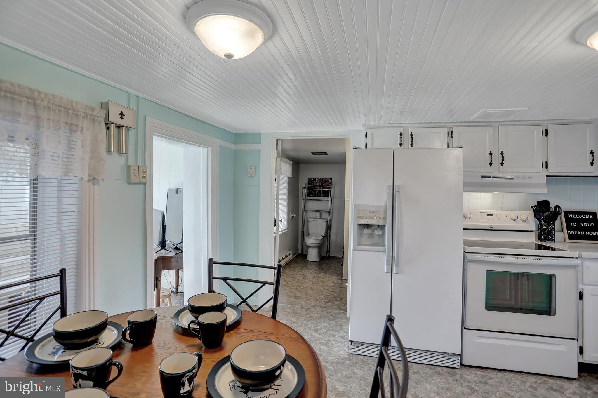231 Mohawk Road Newville, PA 17241 - Photo 11 of 72 a kitchen with stainless steel appliances a refrigerator and a stove top oven