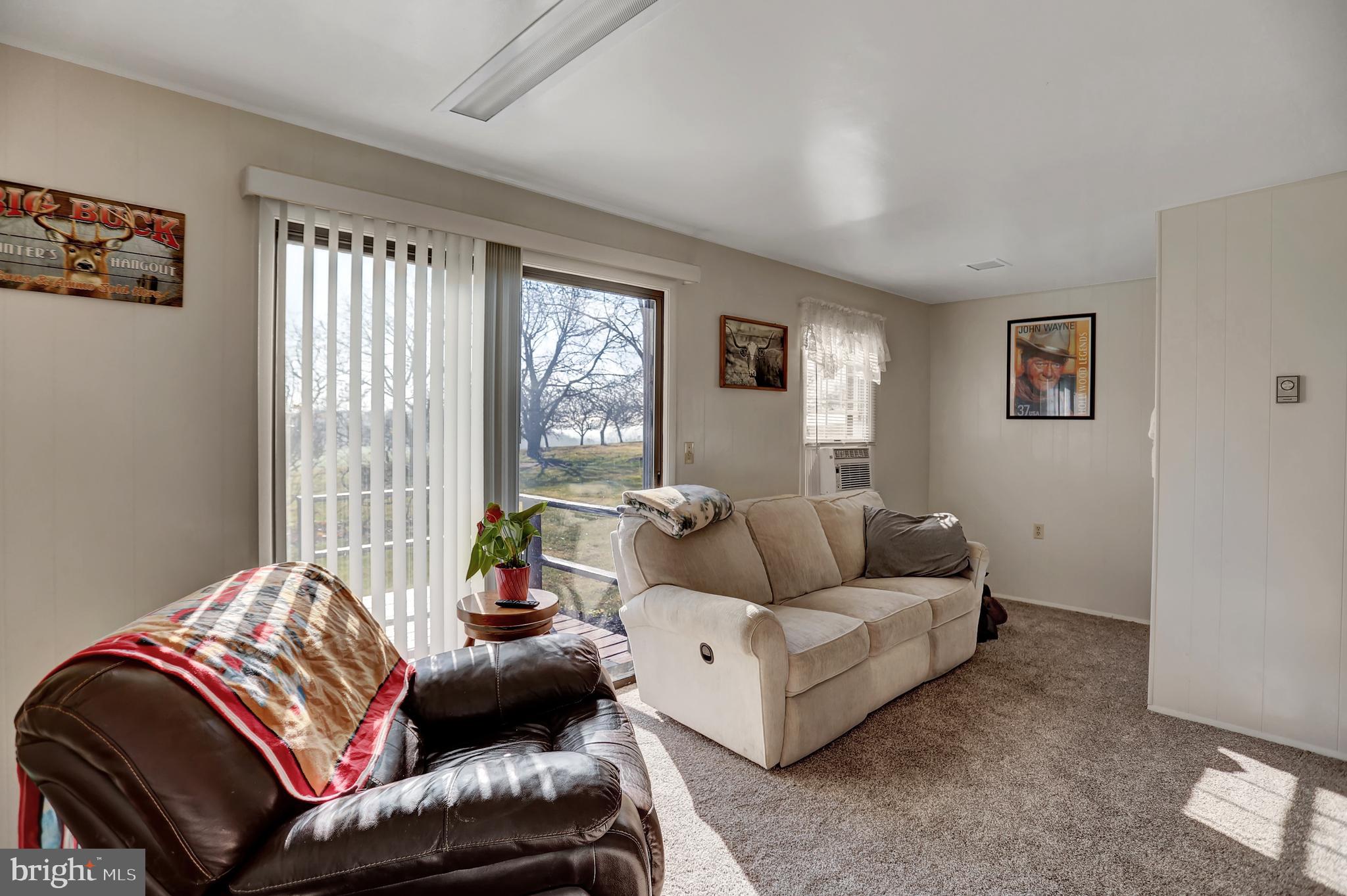 231 Mohawk Road Newville, PA 17241 - Photo 12 of 72 a living room with furniture and a large window