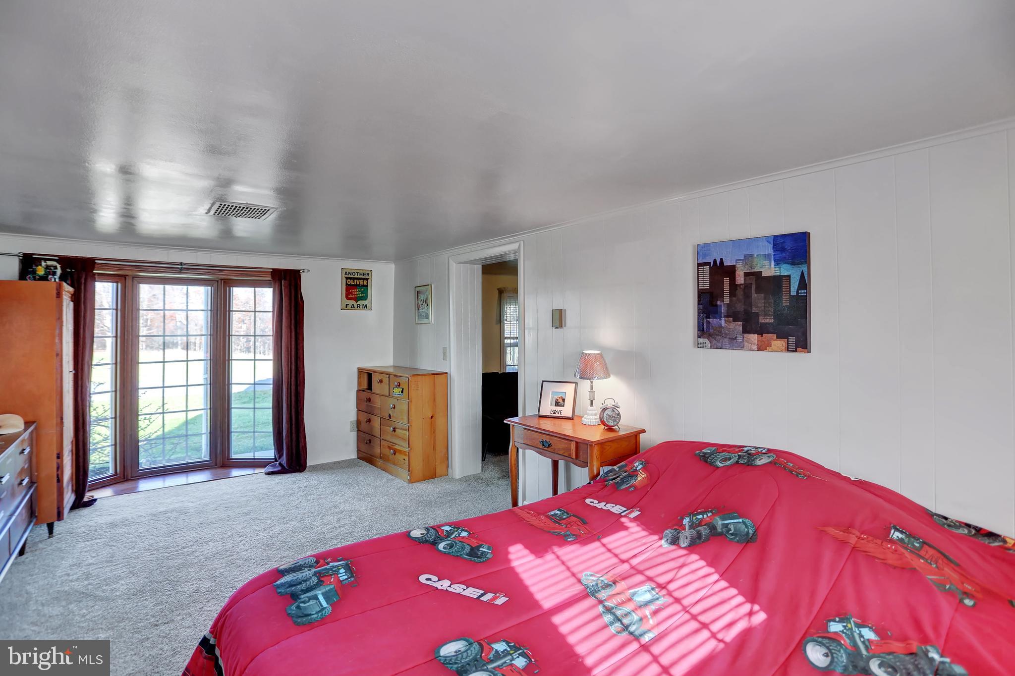 231 Mohawk Road Newville, PA 17241 - Photo 18 of 72 a bed room with a bed and a couch