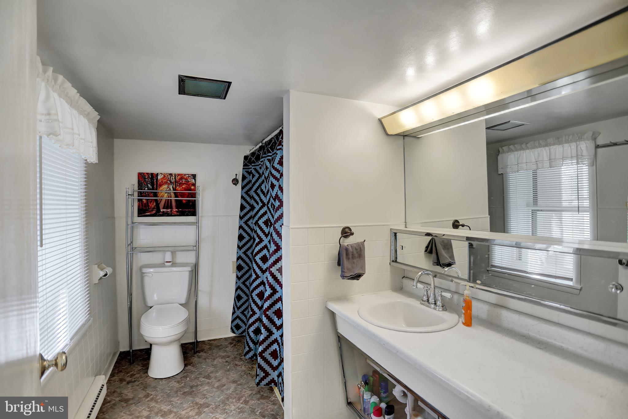 231 Mohawk Road Newville, PA 17241 - Photo 21 of 72 a bathroom with a sink toilet and a mirror