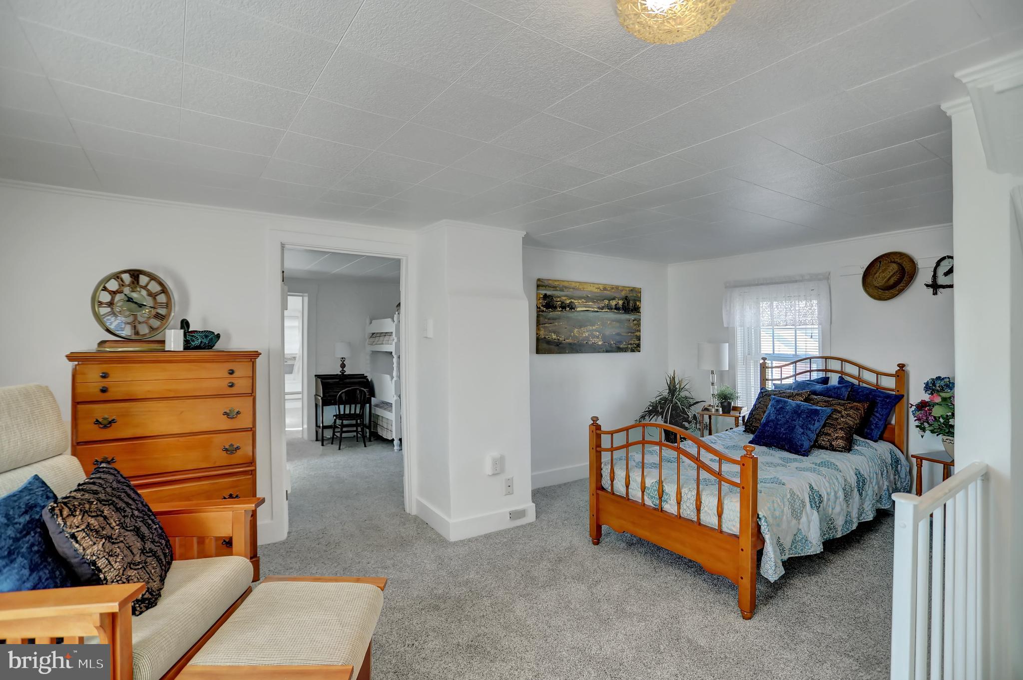 231 Mohawk Road Newville, PA 17241 - Photo 22 of 72 a bedroom with furniture and a lamp