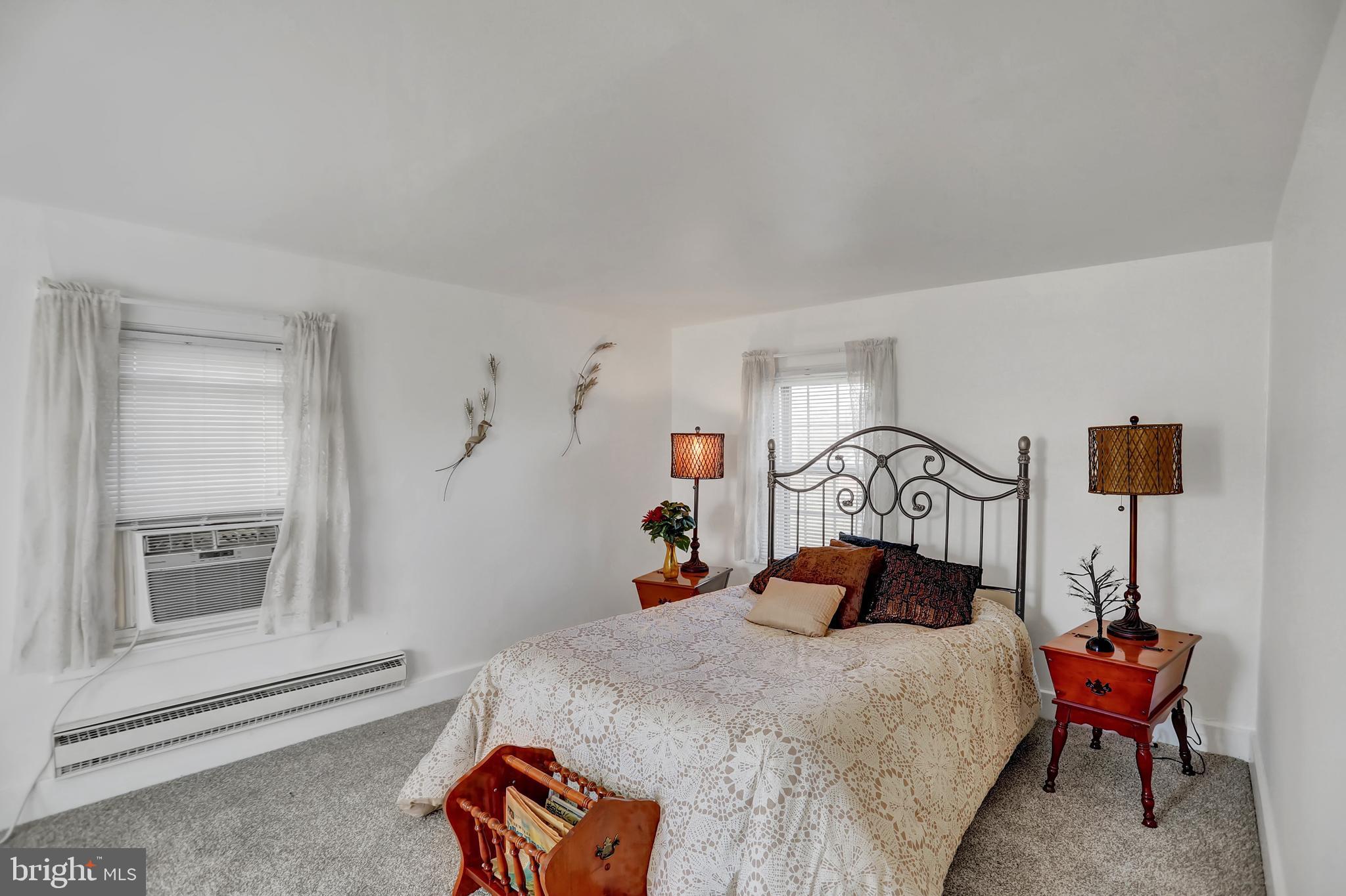 231 Mohawk Road Newville, PA 17241 - Photo 30 of 72 a bed room with a bed and a chair