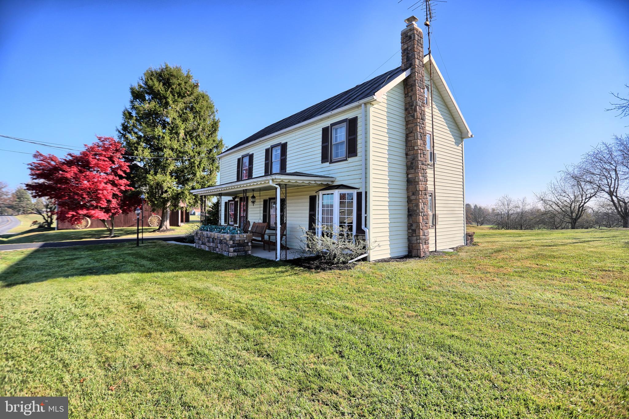 231 Mohawk Road Newville, PA 17241 - Photo 4 of 72 a front view of a house with a garden