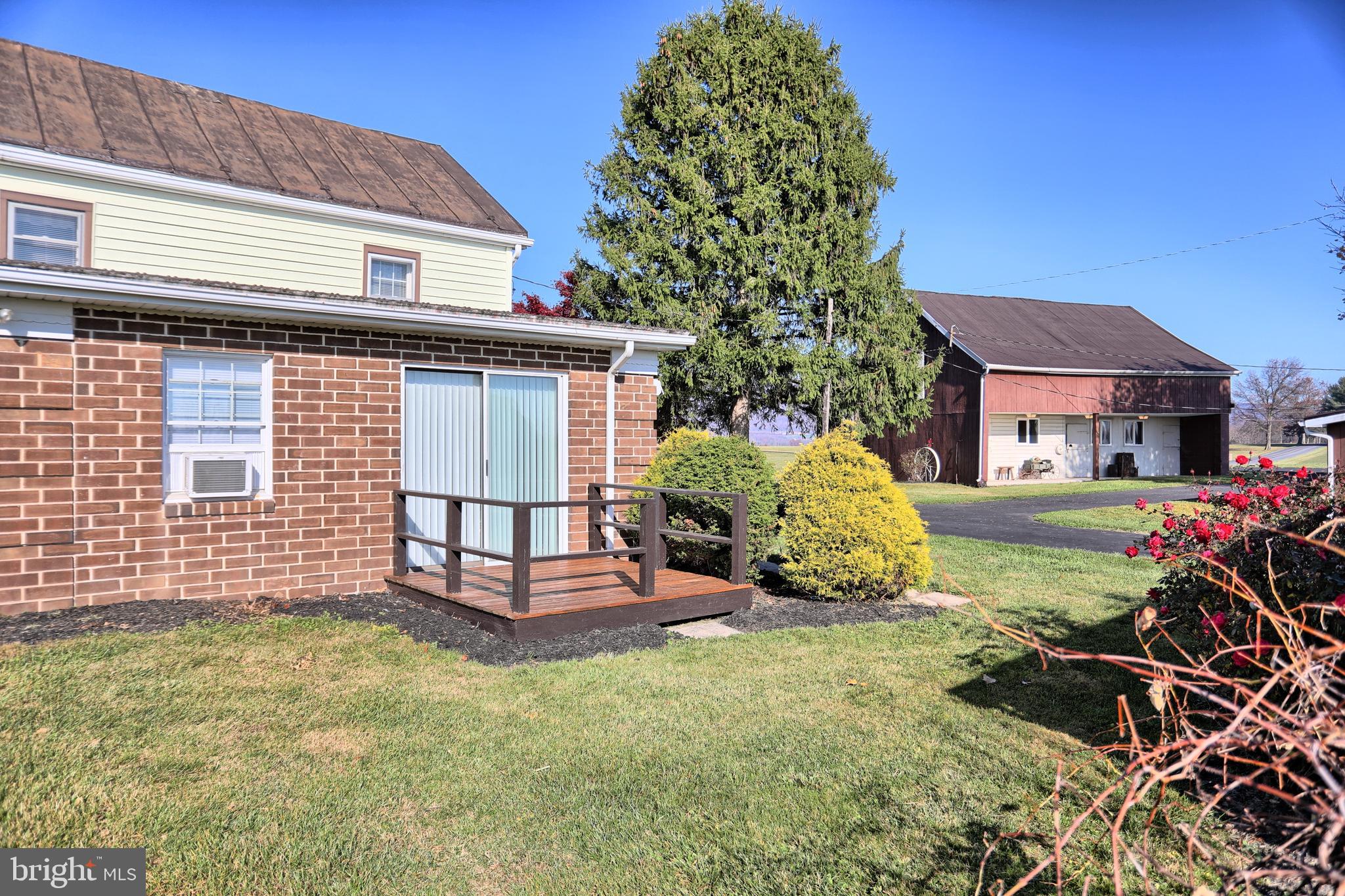 231 Mohawk Road Newville, PA 17241 - Photo 34 of 72 a view of a house with a yard and sitting area