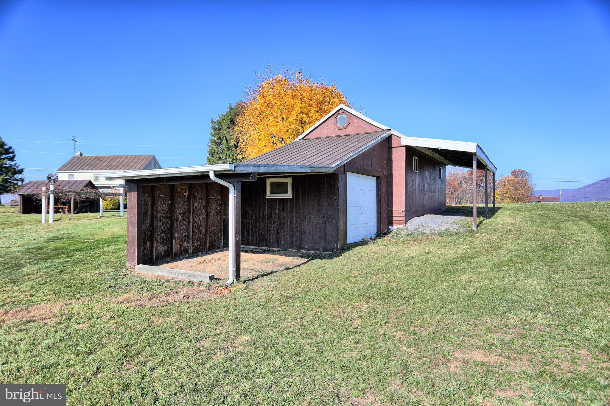 231 Mohawk Road Newville, PA 17241 - Photo 52 of 72 a house with green field in front of it
