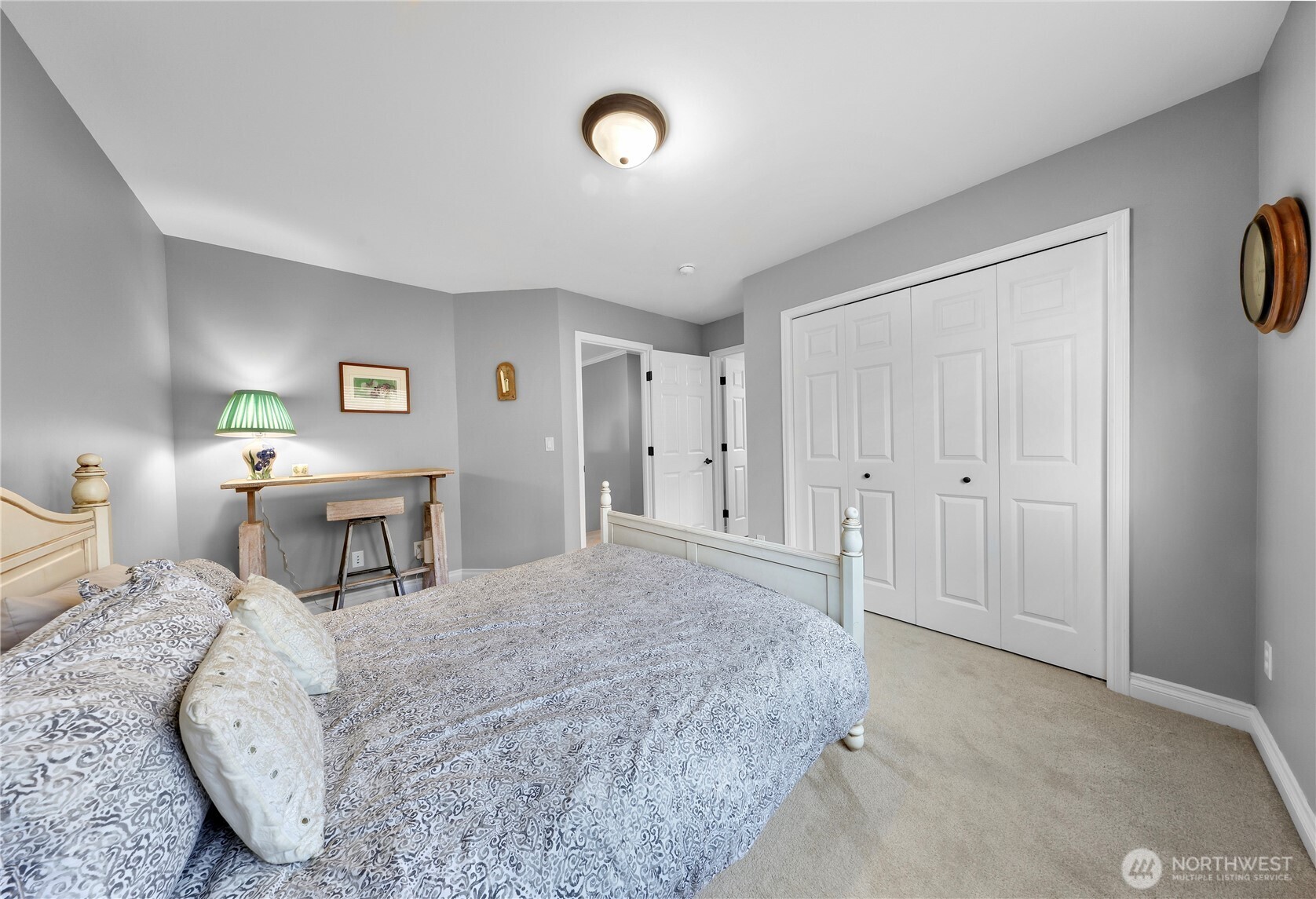 2029 240th Place Southeast Bothell, WA 98021 - Photo 31 of 39 a bedroom with a bed and a cabinets