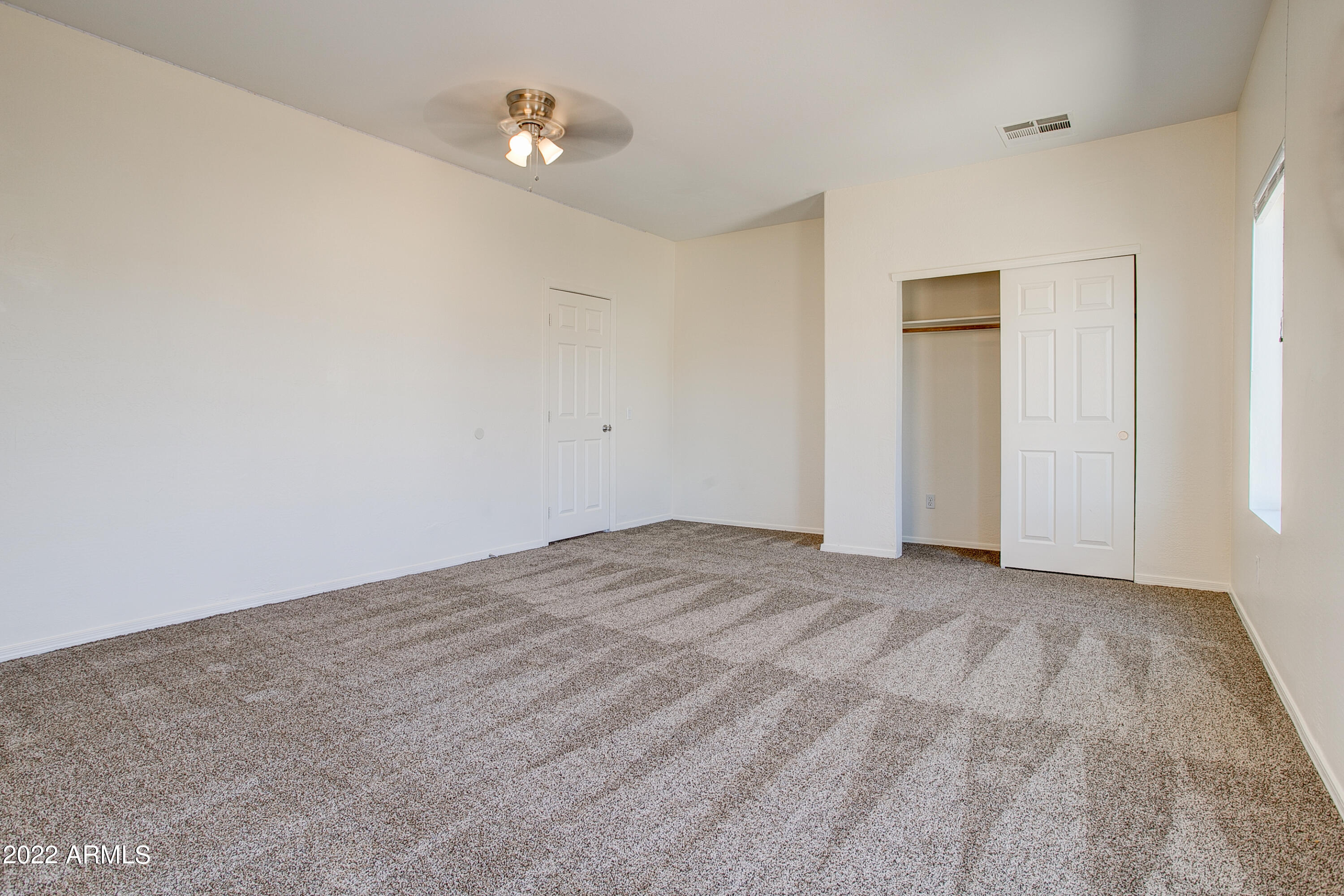 9928 West Chipman Road Tolleson, AZ 85353 - Photo 31 of 42 wooden floor in a room