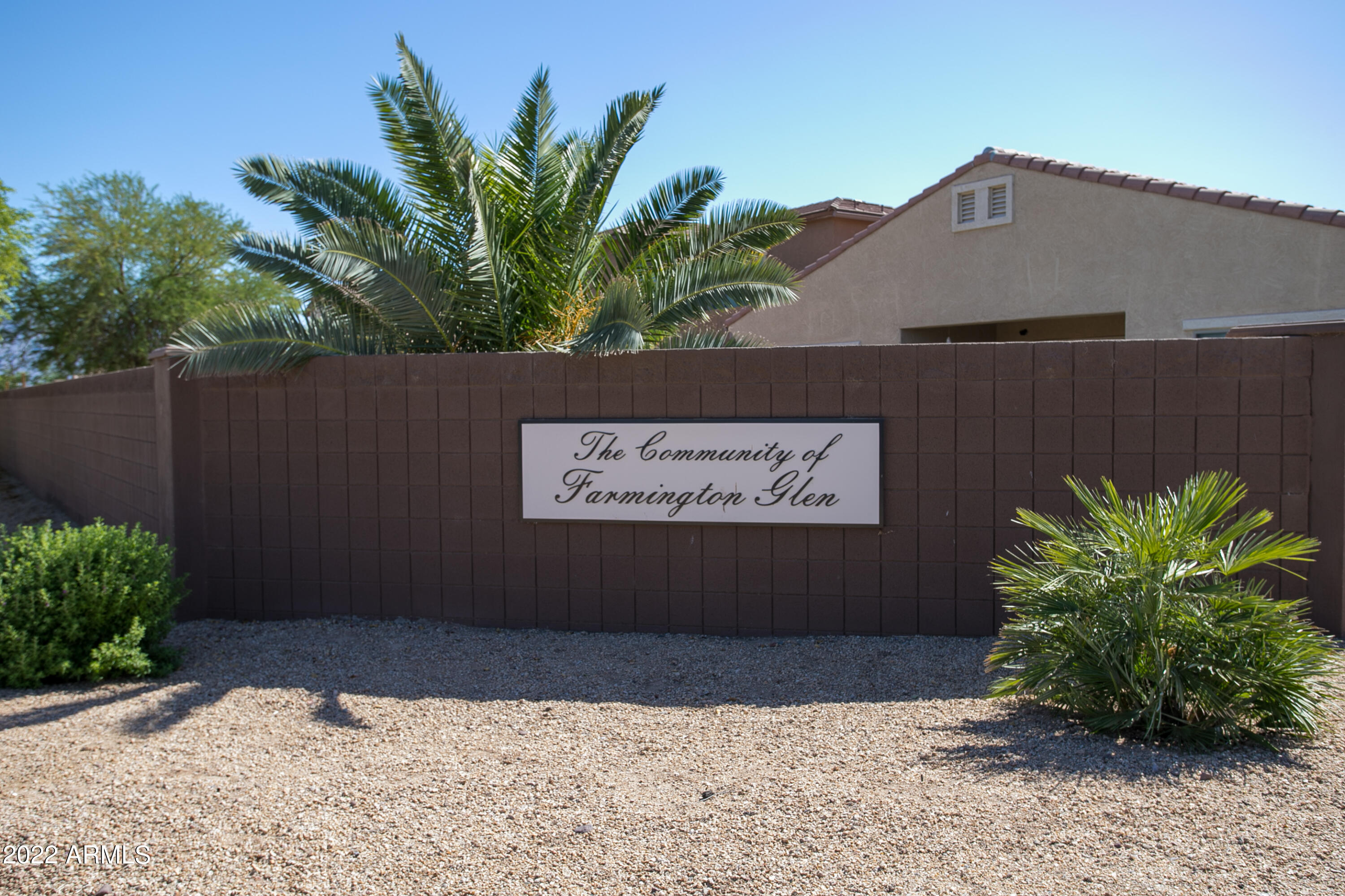 9928 West Chipman Road Tolleson, AZ 85353 - Photo 41 of 42 a view of a street with a sign on the wall