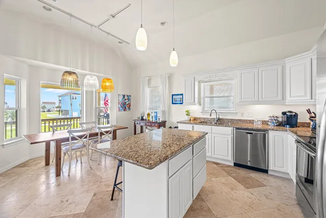 a bedroom with a bed and a table in it