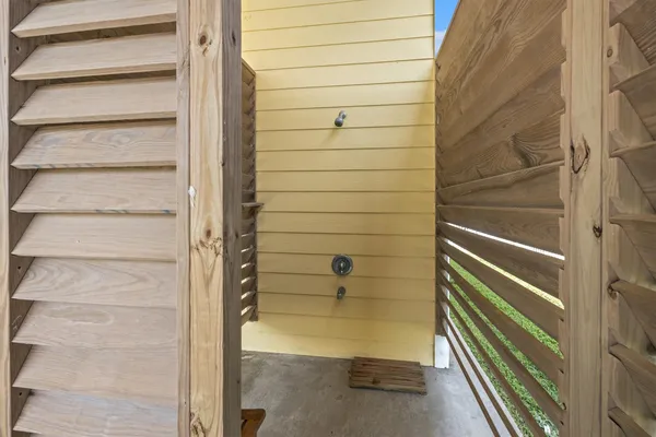 a view of a chairs and table on the deck