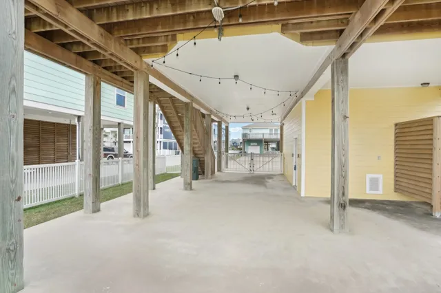 a view of a large building with a big yard and large trees