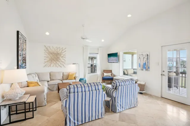 a living room with furniture and a table