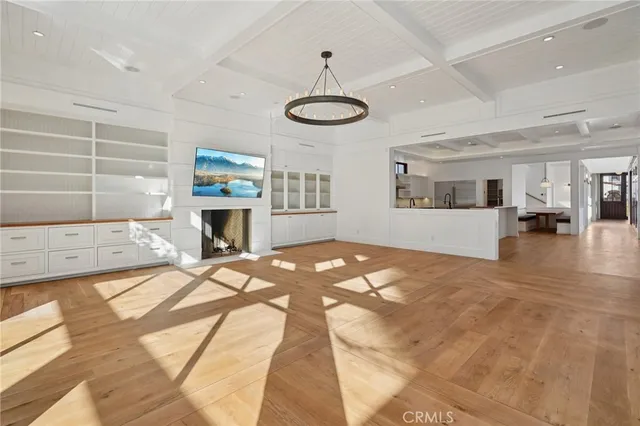 a large kitchen with kitchen island a stove a sink dishwasher and a refrigerator