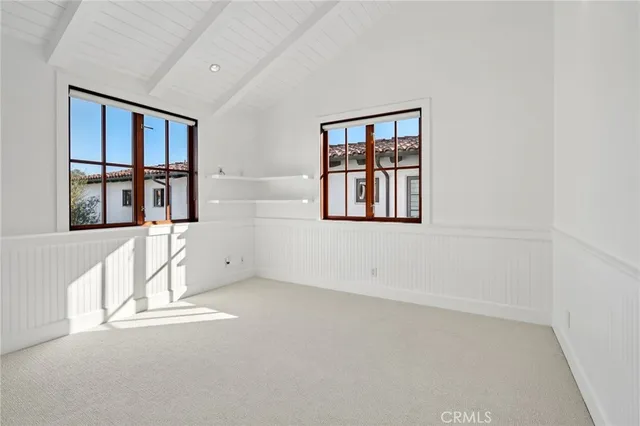 wooden floor and white walls