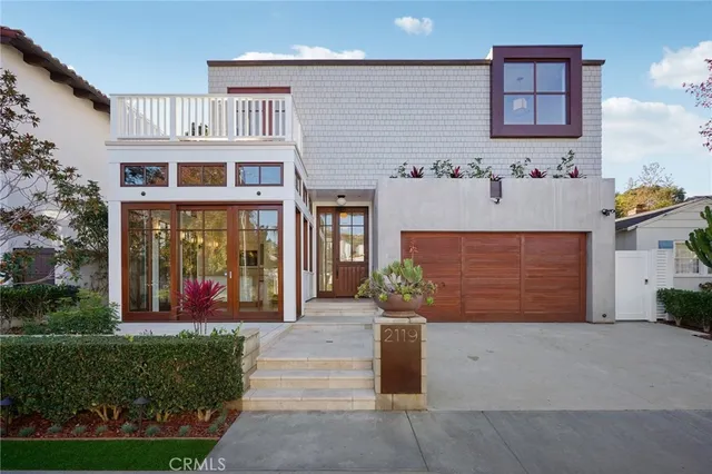 front view of a house with a small yard