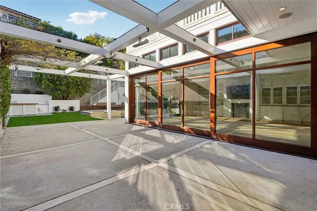 an aerial view of multiple house with yard