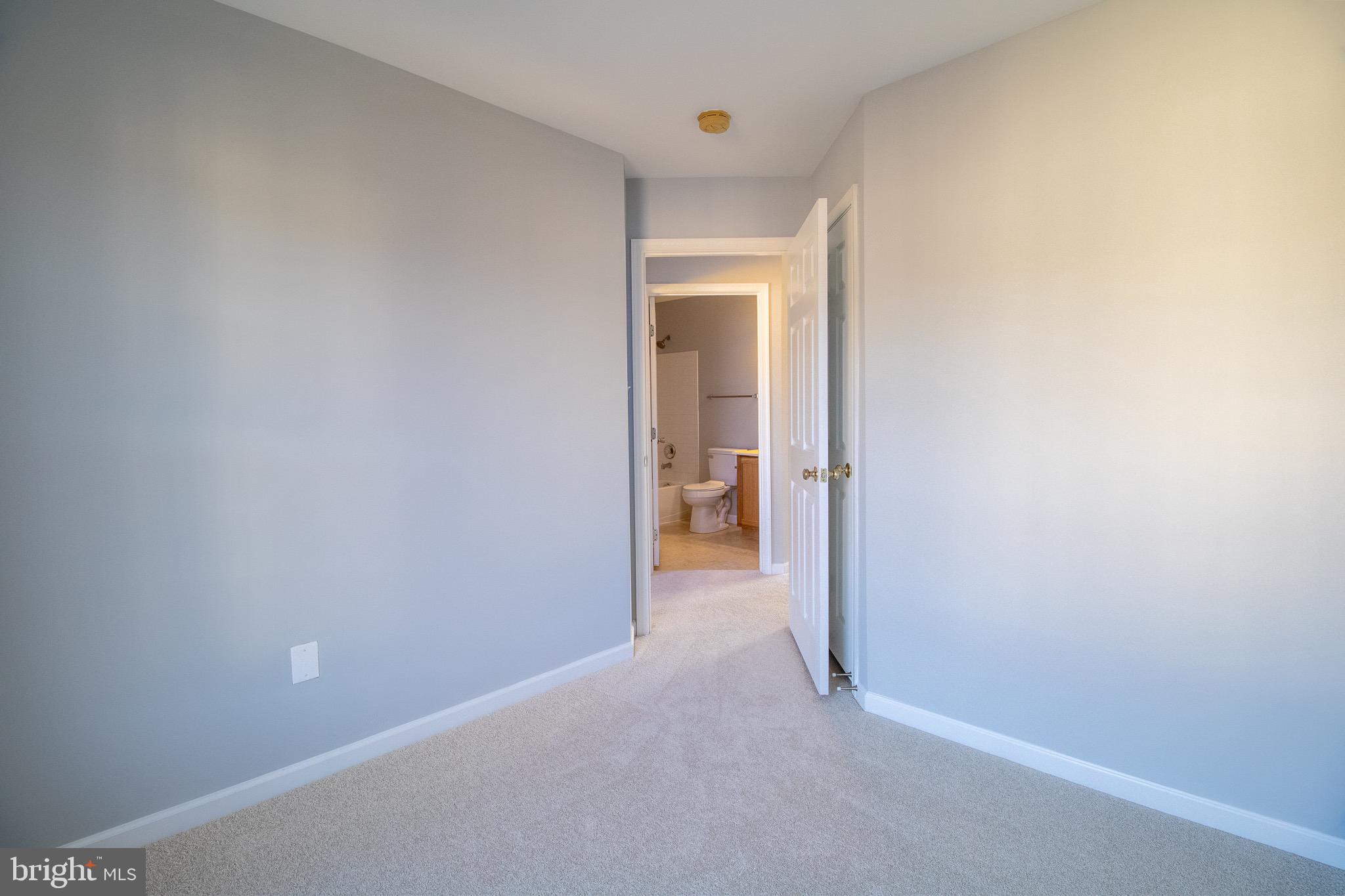 98 Lullwater Way Falling Waters, WV 25419 - Photo 32 of 43 a view of a hallway with a room