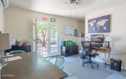 1514 West Bethany Home Road Phoenix, AZ 85015 - Photo 7 of 11 a workspace with furniture and a window