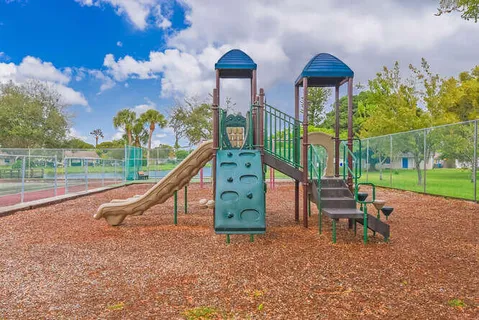 a view of a park with slide