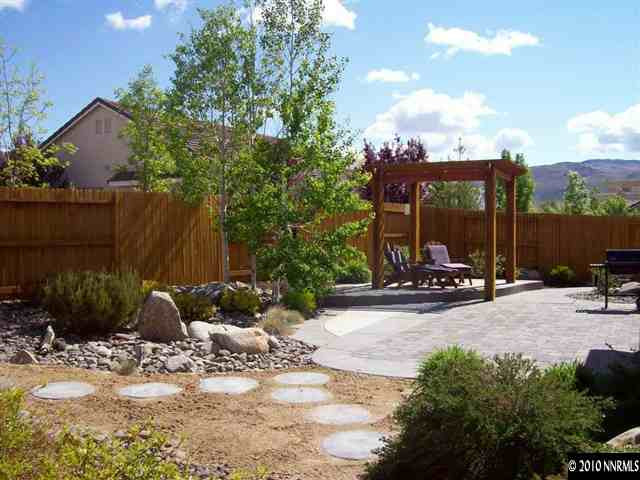 1845 Beringer Way Reno, NV 89521 - Photo 2 of 9 a view of a backyard with sitting area and furniture