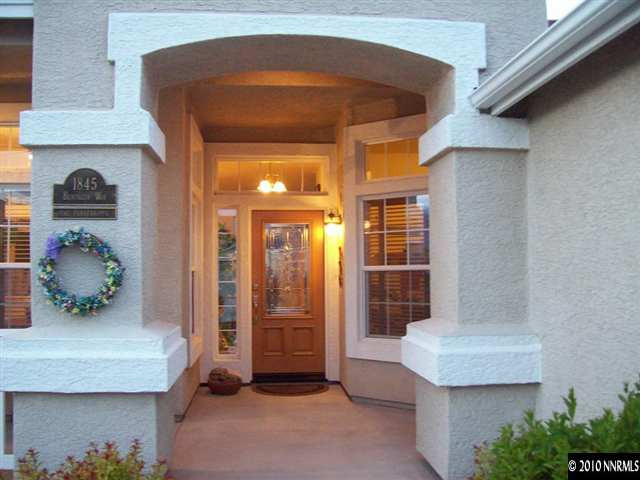 1845 Beringer Way Reno, NV 89521 - Photo 9 of 9 a room with furniture and a potted plant