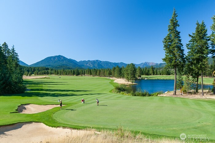 1950 Ruby King Loop Cle Elum, WA 98922 - Photo 11 of 18 a view of a golf course with a lake