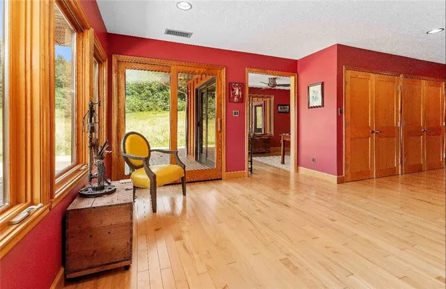 a bathroom with a sink mirror and vanity
