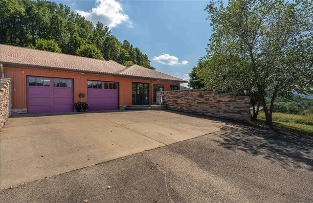 a house view with a outdoor space