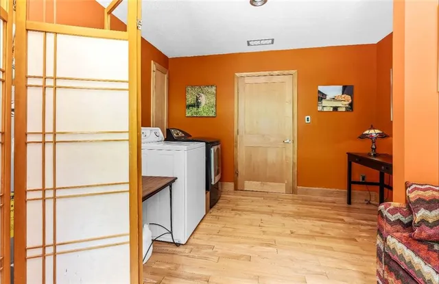 a view of a chairs and table in the patio