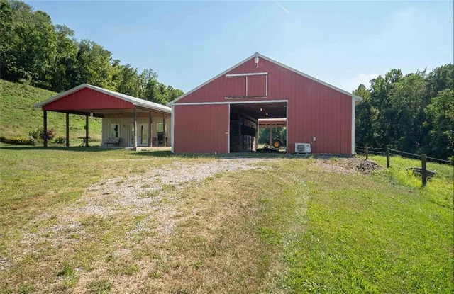 an aerial view of a house and garden