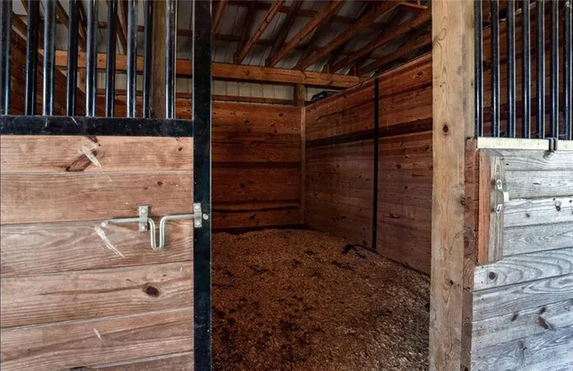 a view of a porch with wooden floor