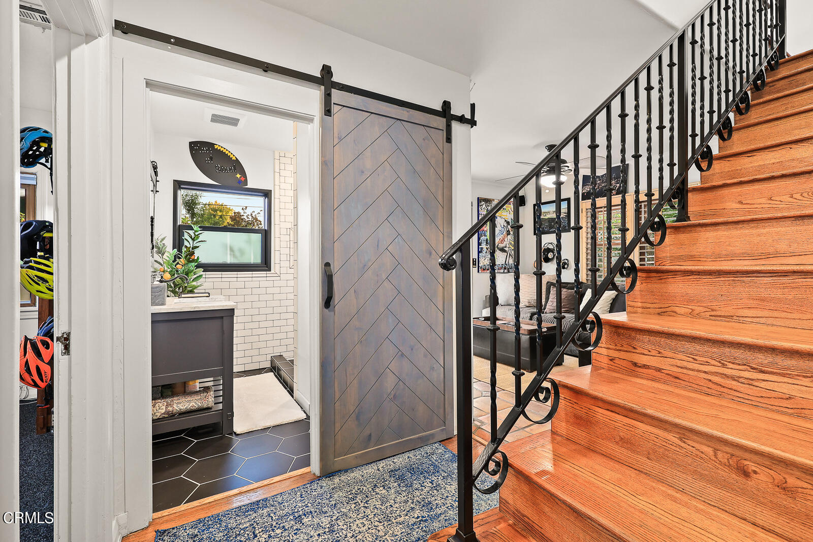 2216 Cooley Place Pasadena, CA 91104 - Photo 12 of 29 a view of staircase with wooden floor and a rug