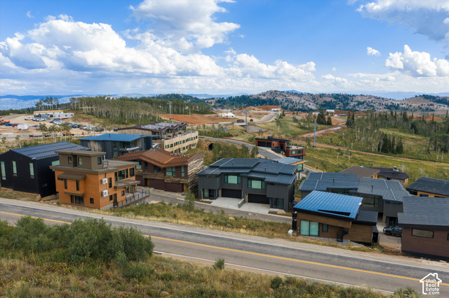 8456 Copper Crest Road, Unit 148 Eden, UT 84310 - Photo 33 of 34 Modern architecture with diverse facade materials and expansive mountain terrain