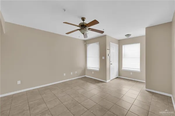 a view of an empty room and window